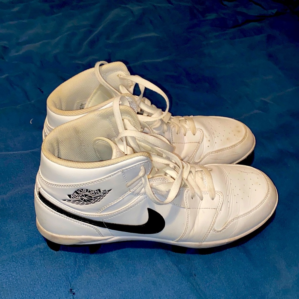 White Jordan 1 molded baseball cleats